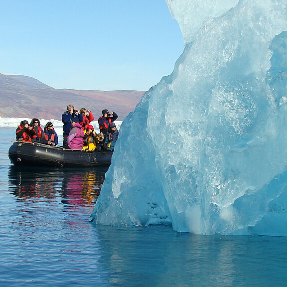 Zodiac_cruising_among_massive_icebergs_Christoph_Gouraud.jpeg 